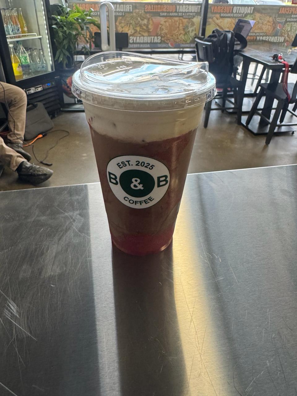 Neopolitan Latte with strawberry, mocha, and vanilla cold foam